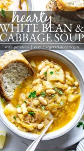 Delicious white bean cabbage soup with potatoes in a rustic bowl